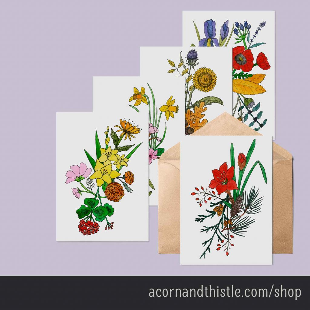 An image with a lilac background depicting five notecards with botanical illustrations of flowers. Four are spread on top of each other from the bottom left corner to the top right. In front of those is one card sitting on top of a brown envelope. 