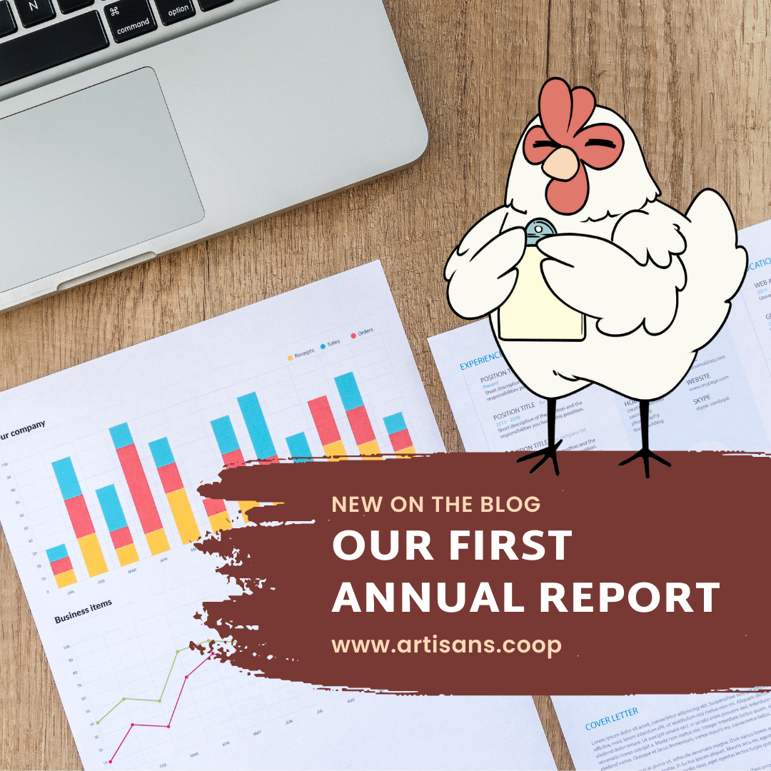 Word graphic of Brook the Artisans Cooperative chicken logo on top of a desktop with reports and computer with words Our First Annual Report