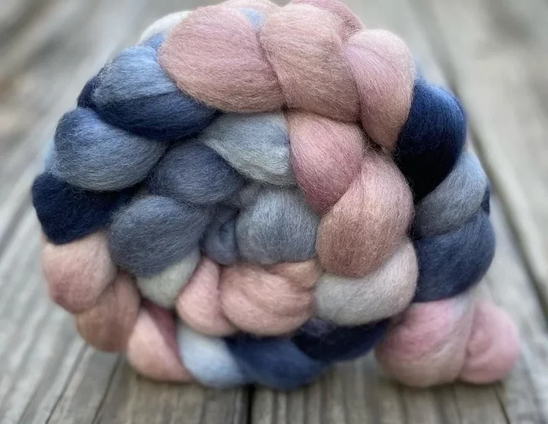 Hand dyed combed top in dusky rose and slate blue by Sycamore Fibers