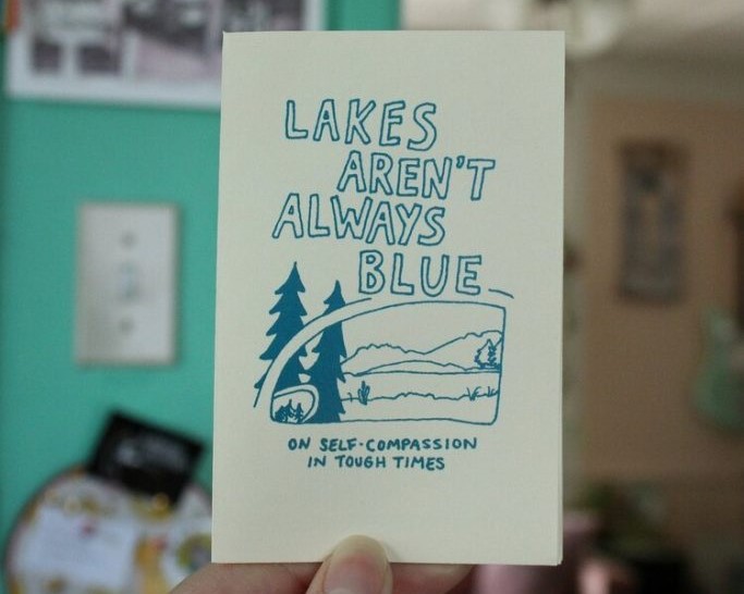 Photograph of "Lakes aren't always blue" self compassion handmade zine