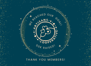 Graphic set to look like a starry sky with a halo of yellow stars on a dark blue background. The words are arranged in a circle around the Artisans Cooperative mascot logo and says We reached our goal! $50k raised! Thank you Members!