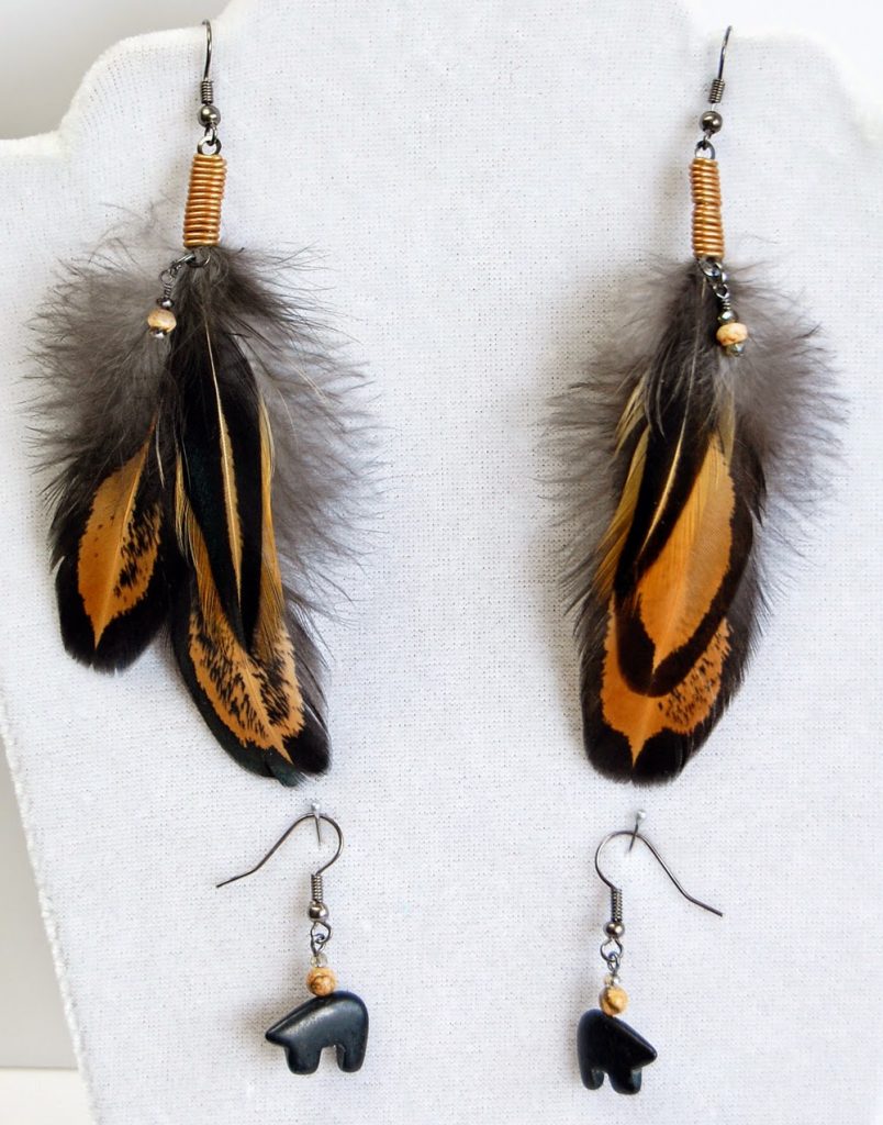 Handmade feather earrings made for a commission by Eclectic Design Choices.