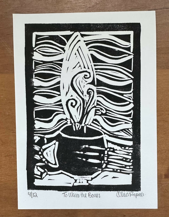 A handcarved block print of a skeleton holding a steaming mug. The print is created with black ink on white paper. The artwork is flowing and interpretive. The skeleton's rib cage fills the frame, a round black mug nuzzled in the boney hands in front of the sternum. Steam curls up from the mug and you can feel the skeleton breathe a bit deeper.
