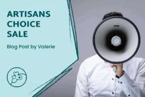 To the right is a close up of a person in a white shirt holding up a megaphone to their face in a way you can't see their face. To the left is a text block that says "Artisans Choice Sale blog post by Valerie" with the Artisans Co-op logo of a chicken face below.