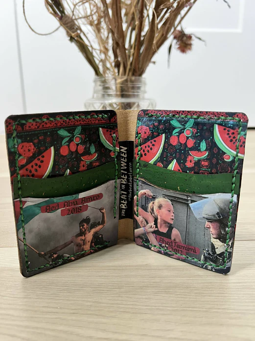 Cork Wallet colored with images of Watermelons, Palestinian freedom fighters from history, and green accents.