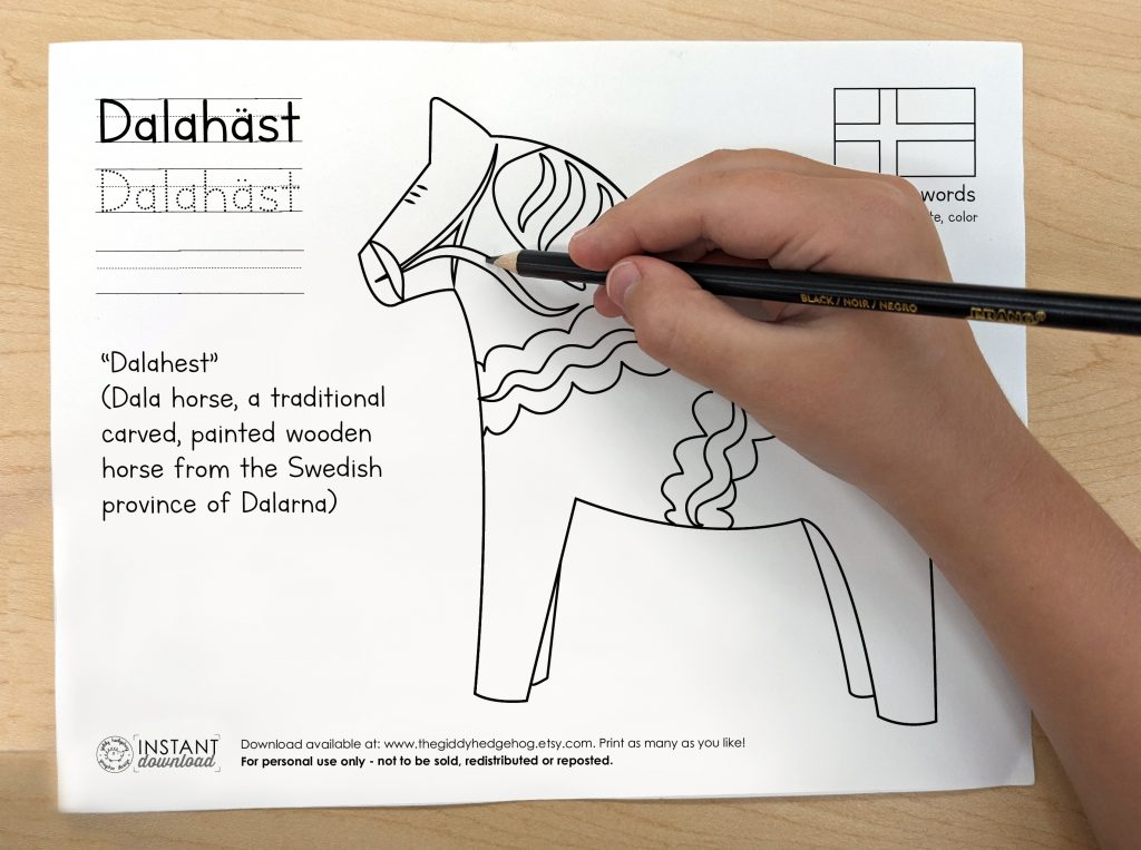 Picture of a child's hand drawing in a printed coloring page that is a downloadable digital design. the picture is of a swedish folk art horse and the words have the Swedish words with a tracing option, Dalahäst, (Dala horse, a traditional carved, painted wooden horse from the Swedish province of Dalarna)